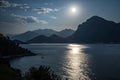 Night landscape with sea, moon, and mountains Royalty Free Stock Photo