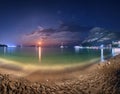 Night landscape at the seashore with lunar path. Seascape