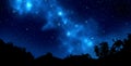 Night landscape with silhouettes of mountains and sky with stars, Starry night sky background. blue sky and milky way with Royalty Free Stock Photo