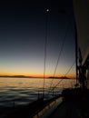 Night landscape with yachts, sea and rigging