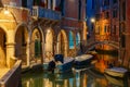 Night lateral canal and bridge in Venice, Italy Royalty Free Stock Photo