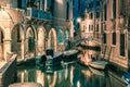 Night lateral canal and bridge in Venice, Italy