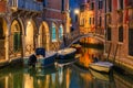 Night lateral canal and bridge in Venice, Italy Royalty Free Stock Photo