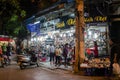 Night life of the street view in Hanoi Old Quarter, people can seen exploring and shopping around it. Royalty Free Stock Photo