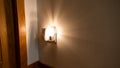 Night light plugged into a wall in a house Royalty Free Stock Photo