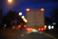 night light of truck car on the city street, abstract blur bokeh background Royalty Free Stock Photo