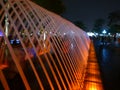 Night light view of tunnel waterjet fountain in Lima