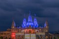 Night lighted image of Shree Swaminarayan temple with monsoon clouds background., Ambe Gaon, Pune .