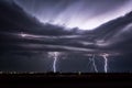 Night lightning striking during a Texas thunderstorm