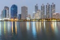 Night lights city office building over water lake Royalty Free Stock Photo