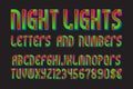 Night lights font of letters, numbers with currency signs of dollar and euro. Isolated typographic symbols Royalty Free Stock Photo