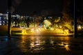 Night lights illuminate the path among the palm trees Royalty Free Stock Photo
