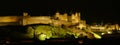 Night lights on the ramparts and castle towers of medieval Carcassonne Royalty Free Stock Photo
