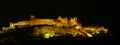 Night lights on the ramparts and castle towers of medieval Carcassonne Royalty Free Stock Photo