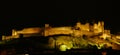 Night lights on the ramparts and castle towers of medieval Carcassonne Royalty Free Stock Photo