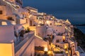 Night lights after sunset at Santorini island, Greece. White architecture in Fira town Royalty Free Stock Photo