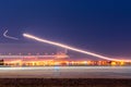 Night lights, tracks of lights in the movement of aircraft on long exposure Royalty Free Stock Photo