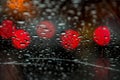 Night lights of urban traffic seen through the windshield in rainy weather. Abstract background. Concept of night city Royalty Free Stock Photo