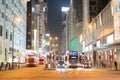 Night long exposure of passing vehicles on busy city street. Royalty Free Stock Photo