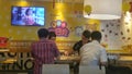 Shenzhen, China: at McDonald`s restaurants, people eat or rest at night.