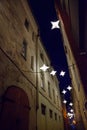 Night medieval narrow street in old city of Riga, Latvia Royalty Free Stock Photo