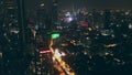 Night megapolis cityscape rooftop blurred lights