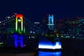 A night miniature Rainbow bridge at the urban city in Tokyo tiltshit