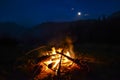 Night Moonlight Bonfire Fire in the Mountains Royalty Free Stock Photo