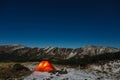 Night mountain landscape with illuminated tent Royalty Free Stock Photo