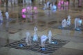 Night musical water fountain.Fuzzy background image