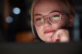 Night, office and woman with laptop reflection in her glasses while working overtime on a project. Technology, late and Royalty Free Stock Photo