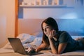 night online bedtime leisure woman laptop bed home Royalty Free Stock Photo