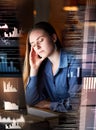 Night overlay, tired or headache of woman in data analysis, trading or stock market depression, burnout or fatigue Royalty Free Stock Photo