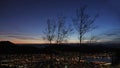 Night Panorama of Bergen city from Floyen viewpoint in Norway with autumn trees Royalty Free Stock Photo