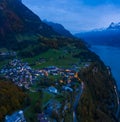 Night panorama of the canton Schwyz, Lake Lucerne. City Morschach. Night lights. Aerial view