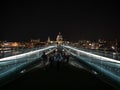 Night panorama of historic Millennium bridge over Thames river at St Pauls Cathedral London England Great Britain GB UK Royalty Free Stock Photo