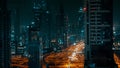 Night panorama of a large modern city, tall buildings and city highway Royalty Free Stock Photo