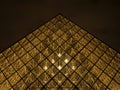 Night panorama of Louvre pyramid glass design architecture museum building construction in Paris France Europe