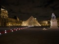 Night panorama of Louvre pyramid glass design architecture museum building construction in Paris France Europe Royalty Free Stock Photo