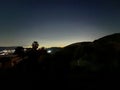 Night panorama of Naples in Italy with the outline of the Vesevius volcano visible Royalty Free Stock Photo