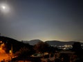 Night panorama of Naples in Italy with the outline of the Vesevius volcano visible Royalty Free Stock Photo