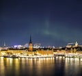 Night panorama with northern lights of Gamla Stan Old Town, Stockholm , Sweden Royalty Free Stock Photo