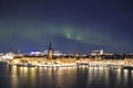 Night panorama with northern lights of Gamla Stan, Stockholm , Sweden Royalty Free Stock Photo