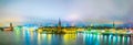 Night panorama of Stockholm including the Stadshuset town hall, Riddarholmskyrkan church and Gamla Stan old town Royalty Free Stock Photo
