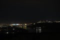 Night panorama. View of the night city and the river. Royalty Free Stock Photo