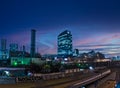 view of the skyscraper Business Center 101 tower and a high chimney of the Kiev combined heat and power