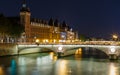 Night panoramic cityscape of Seine river and Paris, France, Europe. Seine is famous tourist destination with many landmarks. View Royalty Free Stock Photo