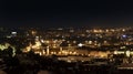 Night panoramic photo of the city with the river and beautiful reflections on the surface