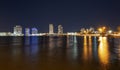 Night panoramic photo of Miami landscape. Bayside Marketplace Miami Downtown behind MacArthur Causeway from Venetian