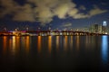 Night panoramic photo of Miami landscape. Bayside Marketplace Miami Downtown behind MacArthur Causeway from Venetian